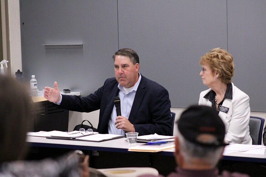 Matt Krogman of Brookings speaks at a property tax forum in Rapid City on Saturday.