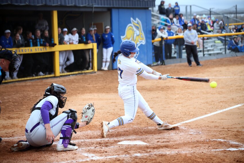 South Dakota State’s Rozelyn Carrillo hits the ball during the third inning of a 5-2 win over St. Thomas at the Jackrabbits Softball Complex on Saturday in Brookings. That was the first game of a doubleheader and the Jacks won game two 8-0.