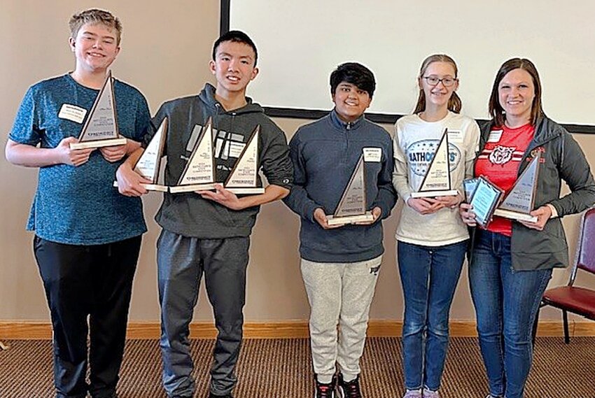 National qualifier Kerrick Zhang, left, with coach Shannon Renkly. Zhang will compete at the National MathCounts Competition in Washington, D.C., on May 11-14.
