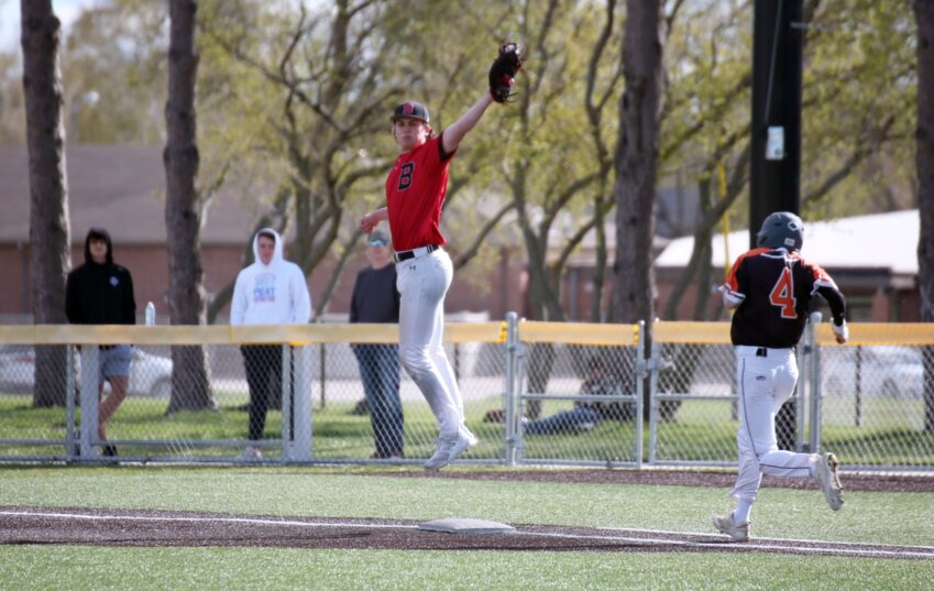 Bobcats first baseman Addison Ronning leaps for a high throw during a game against Huron at Bob Shelden Field in Brookings on Thursday afternoon. The Bobcats won the game 11-1.