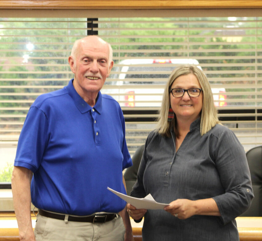 Gary Harrington, left, is sworn in as Huron’s mayor on June 8, 2020, by Paullyn Carey, City finance director. Harrington will complete his term as mayor when Mark Robish is sworn in Monday at the next City Commission meeting.
