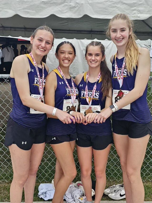 Setting a new school record in the 4x800 meter relay were the Flandreau girls relay team of Faith Wiese, Kiley Westberry, Josie Hamilton and Morgan Sheppard. They broke a 36 year old mark set in 1988.