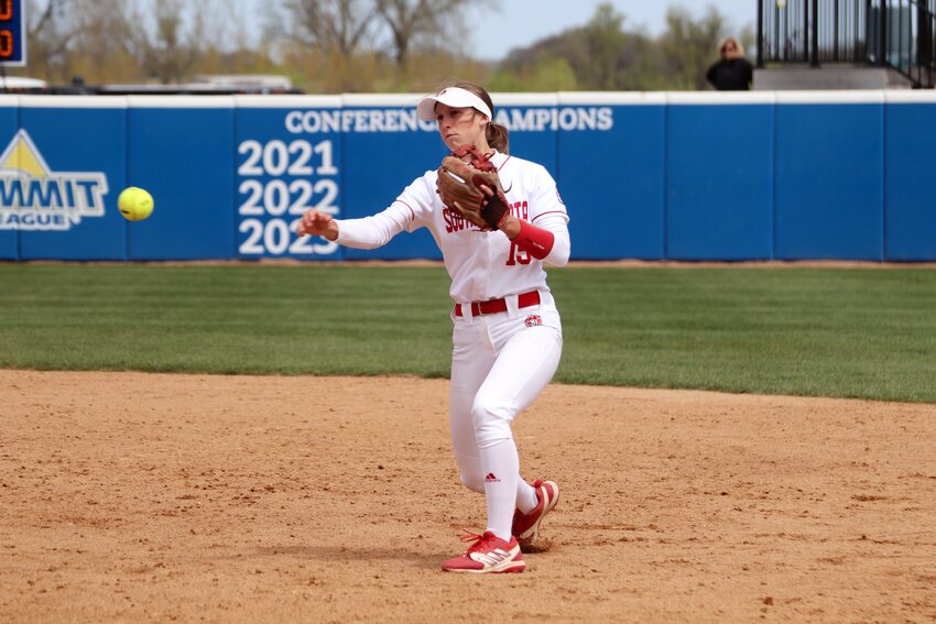 South Dakota second baseman Tatum Villota throws the ball to first base during a 6-5 victory over North Dakota in the Summit League Softball Tournament in Brookings on Wednesday.