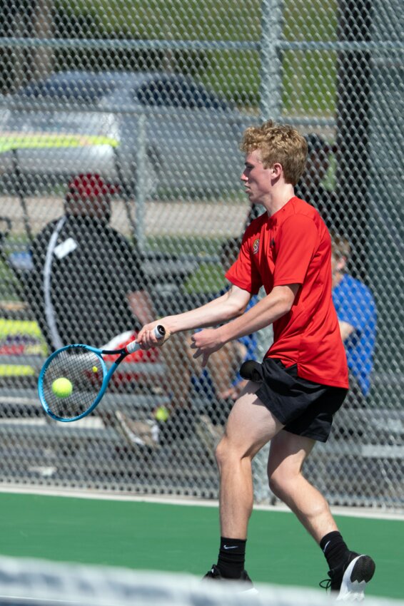 Brookings’ Braylon Peters swings at the ball during a match at the Boys Tennis State Tournament at McKennan Park in Rapid City on Friday. Peters and Carson Kreie lost in the consolation semifinals in the No. 1 doubles flight.