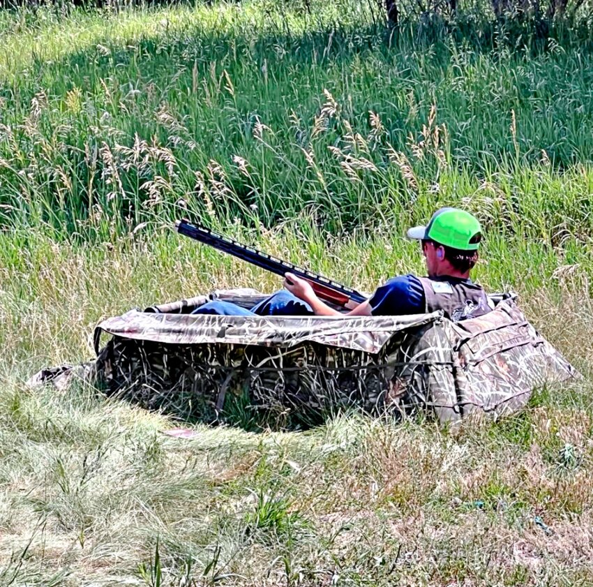 An SDSU Extension 4-H shooting sports member competes in the hunting skills discipline at the 2023 4-H Shooting Sports National Championship.