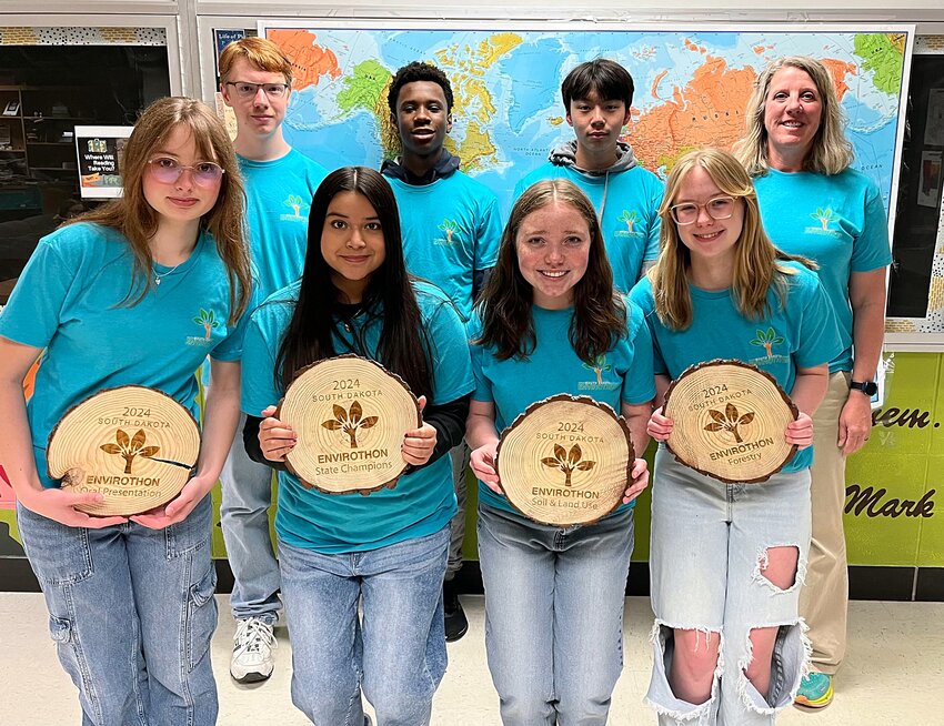 Brookings High Envirothon teams: Back: Quinton Zhu, Nana Dwomoh, Sam Caugherty and coach Lisa Kannegieter-Bahe. Front: State champs Mallory Wells, Marylin Lopez, Madelyn Berkenhoff and Brielle Smetana.