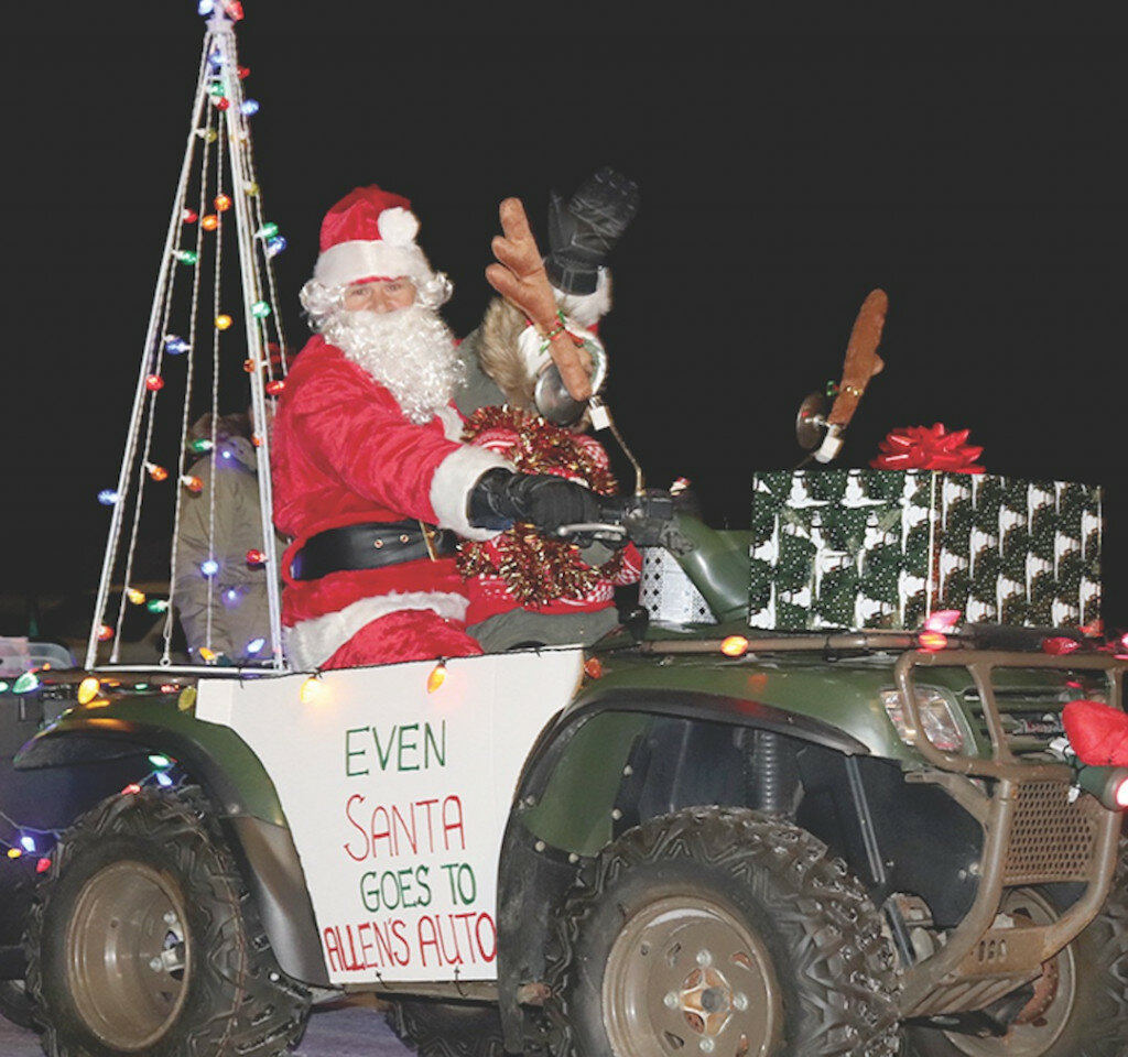Santa Claus rode through the Flandreau “Country Christmas” last Saturday evening on a decorated four wheeler telling everyone where to go for auto service work. The annual Flandreau Parade in downtown and Light Up Flandreau at the Moody County Courthouse was well attended despite the cold weather. So cold in fact our Enterprise camera froze up!