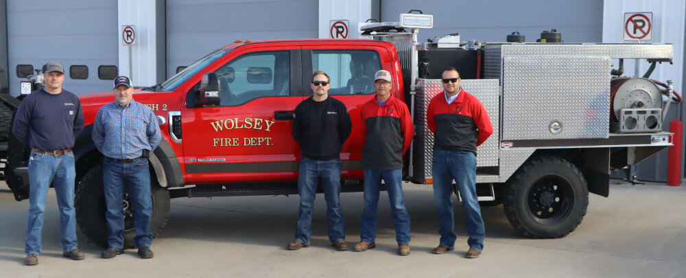 Photos by Benjamin Chase/Plainsman
Wolsey Fire Department members pose with the department’s current utility truck. From left, Tyler Horn, Derrick Freese, Logan Rietveld, Mike McCready, and Dave Jensen.
