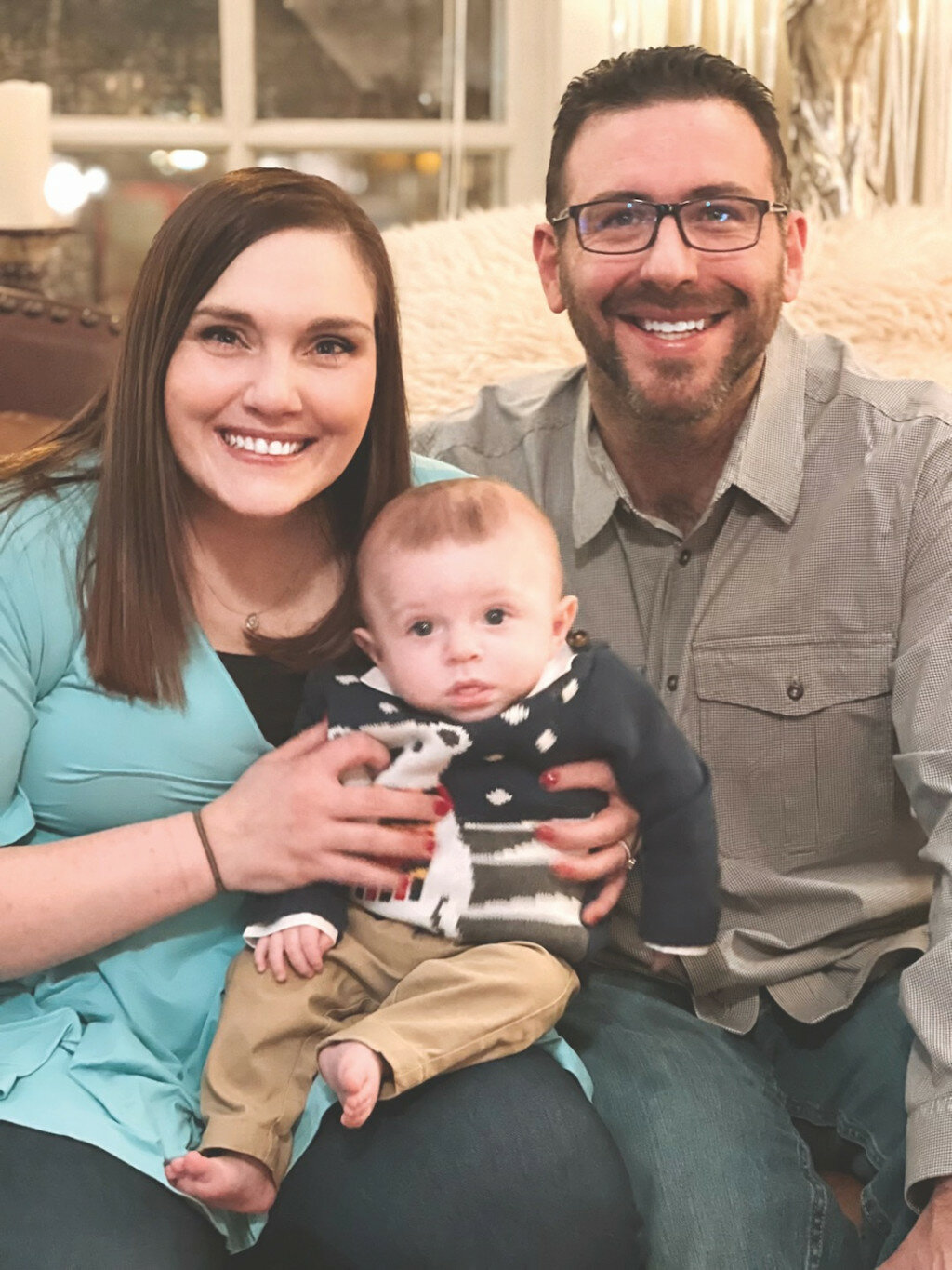 Cole Wingen, the new manager for Skroch Funeral Chapel, is pictured here with his wife, Jessica, and the couple’s five-month-old son, Jack. The family will be moving into the home above Skroch Funeral Chapel in Flandreau as soon as remodeling is done.
