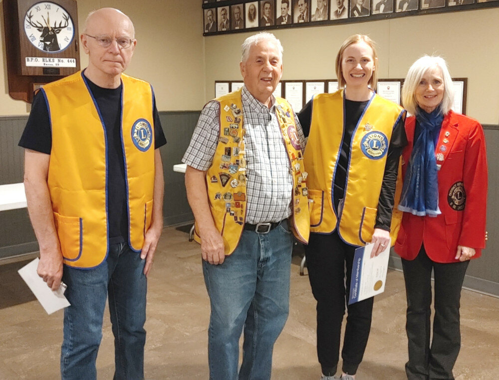 Courtesy photos
Lions International District Governor LeeAnn Haisch welcomed two new members to the Huron Noon Club on Jan. 30. 
On the left are new member Gary Leendowski, sponsor Alan Greenfield, new member Katelin Albers-Kleinsasser and Haisch.