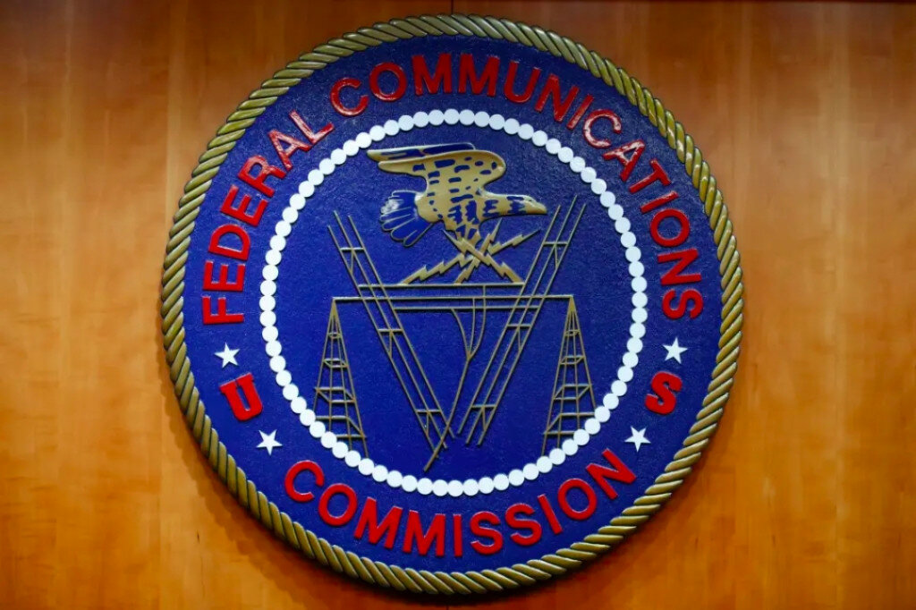 The seal of the Federal Communications Commission is seen before an FCC meeting to vote on net neutrality on Dec. 14, 2017, in Washington, D.C. (AP Photo/Jacquelyn Martin, File)