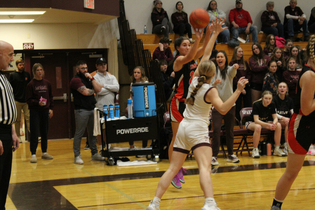 Huron Tiger Hamtyn Heinz shoots a three-pointer during Friday night’s girls basketball game in Spearfish. The Tigers lost to the Spartans 55-39. 
Photo Courtesy Dennis Knuckles, Black Hills Pioneer