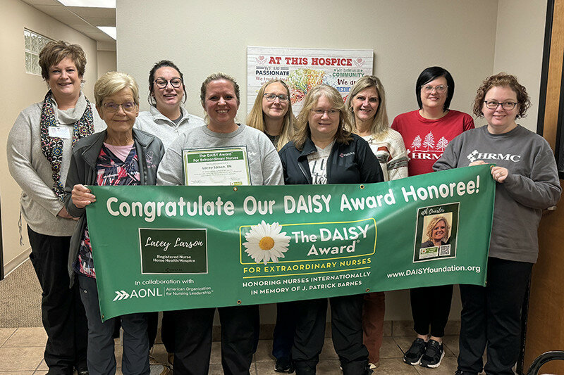 Courtesy Photo
Lacey Larson, RN, (second from the left in the front row) poses for a photo with colleagues following receipt of the DAISY Award.