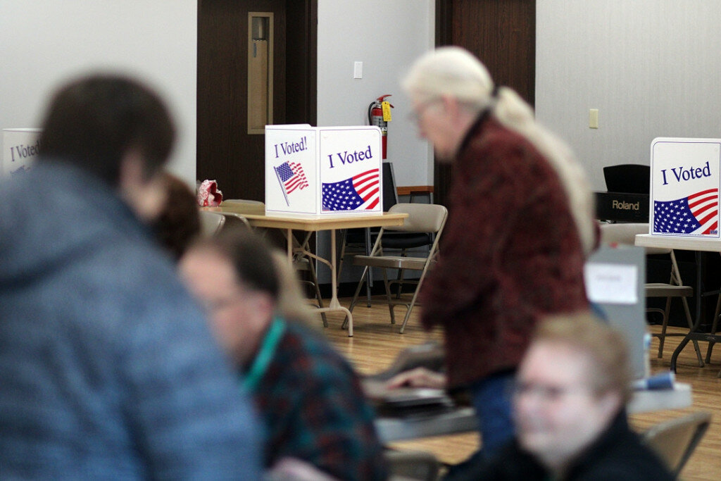 Voters were busy casting their ballots at the Brookings Activity Center on Tuesday morning. In the end, they chose to say “yes” to the city’s sale of 10 acres of Brookings Marketplace land to Minneapolis-based Ryan Companies. (Mondell Keck/Brookings Register)