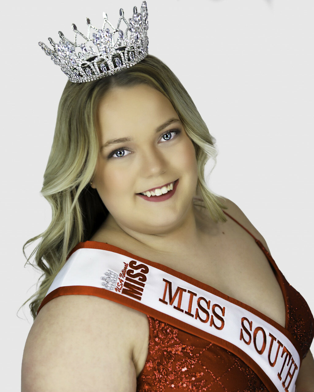 courtesy photo
Jaycee Clark of Huron is shown wearing the sash and crown she received for competition in the USA National Miss pageant planned in July. She is the first from South Dakota to be represented in the pageant.