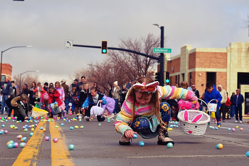 Choices matter! Excited children scamper to load their baskets with Easter eggs on Saturday morning in downtown Wheatland. Music from classic Disney cartoons and other movies was piped through the air by DJ Majik Justin Herdt, while children were also able to get photos taken with the Easter Bunny. 