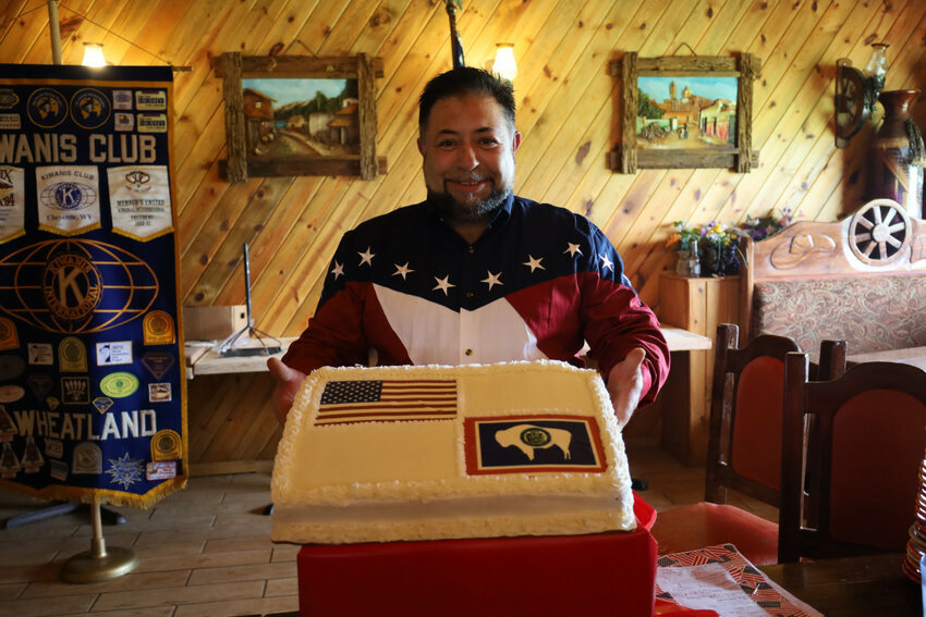 Cutline 1:
Mario Ibarra celebrated his American Citizenship with a party at his restaurant in Wheatland.

Cutline2:
Many people from Wheatland came out to celebrate Mario Ibarra’s becoming a United States citizen. The Kiwanis Club which holds their monthly meetings at the restaurant honored him with a metal American Flag and a Wyoming T-shirt.