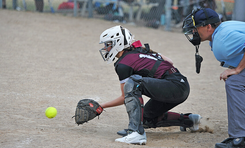 Sophomore Skyla Wunder plays catcher during the first Laramie on March 21.
