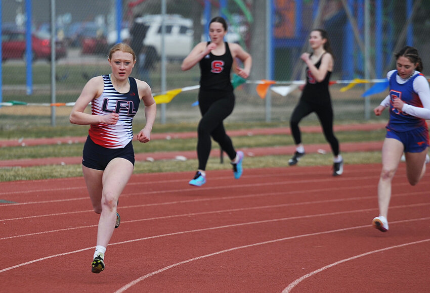 Sophomore Jordynn Speckner pulls ahead of the competition in the 400-meters at Scottsbluff. Speckner won the event with a state-qualifying time.