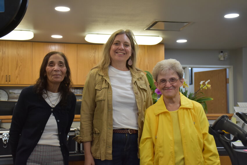 Goshen County Library Director, Cristine Braddy (center), stands with longtime devoted public librarians Anita Sanchez (left) and Janet Flock (right) Thursday morning. The library is incredibly keen on getting summer plans and activities going for both children and adults in the warm weeks to come.
