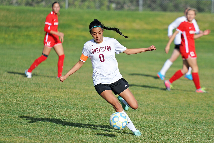 Junior Marisol Munoz clears the ball from Torrington’s territory during the April 16 away game against Scottbsluff.