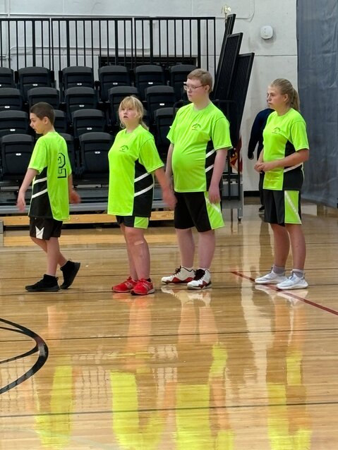 The Goshen County Special Olympics basketball team stands and takes a breather at the Cheyenne Games. The team will be moving on to state games in Gillette on May 2-3. Pictured from left to right are coach Craig Schadwinkel, Anneke Kramer, Xavier Harkins, Amelia Winter, EJ Haas, and coach Sage Munoz.