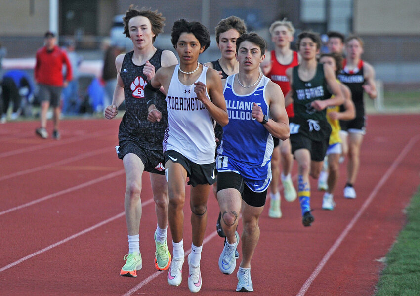 THS senior Zabdiel Munoz, center, maneuvers to the front of the pack in the 1600-meters. Munoz maintained the lead through four laps to capture the championship in the event with a time of 4:51.55.