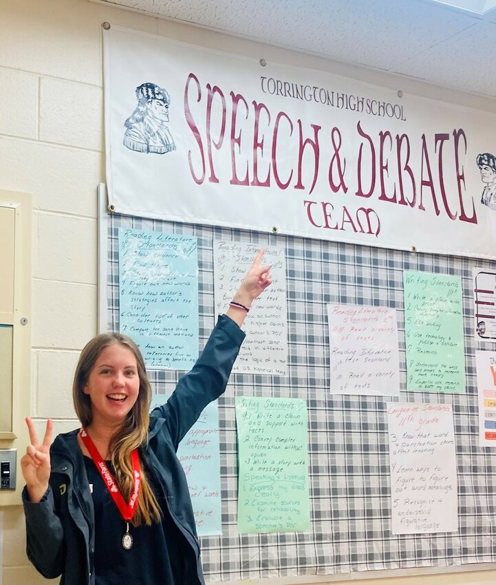 THS junior Sarah Birdsall celebrates after learning she captured second place in the 1A/2A Division for original oratory at the Wyoming State Speech and Debate Tournament at Laramie County Community College in Cheyenne in March.