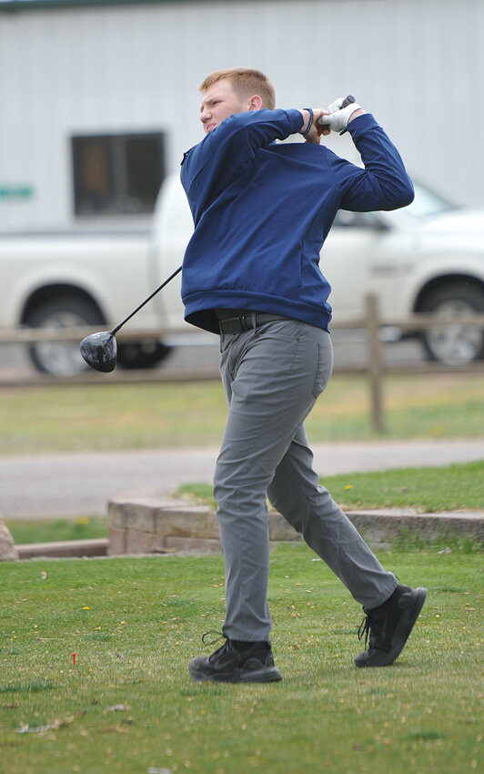Junior Mason Wilkes tees off at the Torrington home golf tournament at Cottonwood Country Club on April 26. Wilkes helped the Blazers achieve first place at the Tiger Invite in Lusk on May 4 by placing fourth with 90 strokes.