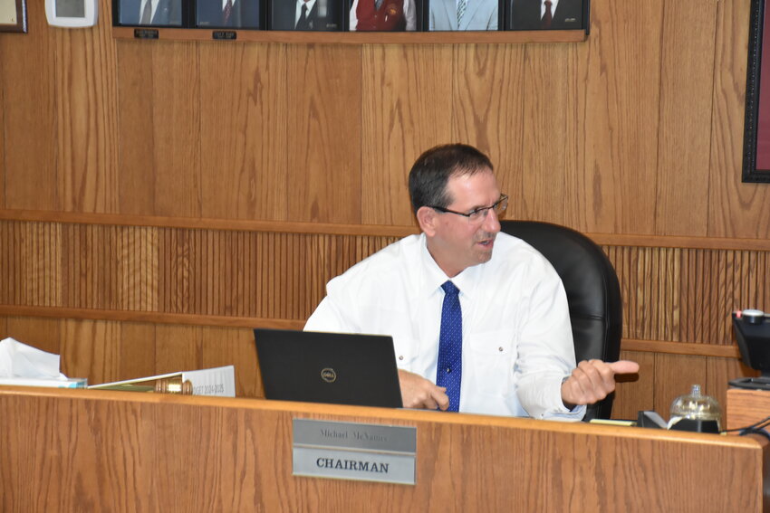 Goshen County Commissioners Aaron P. Walsh (left), Justin Burkart (center), and chairman Michael McNamee (right) discuss thoughts, ideas, and county priorities as busy summer months fast approach.