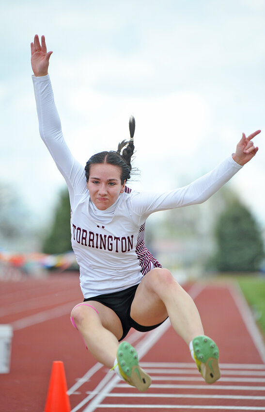 Senior Alyssa Wondercheck comes in for a landing in the long jump at the 3A East regionals in Wheatland on Friday. Wondercheck captured the championship in the event, setting a new Torrington High School record in the process.