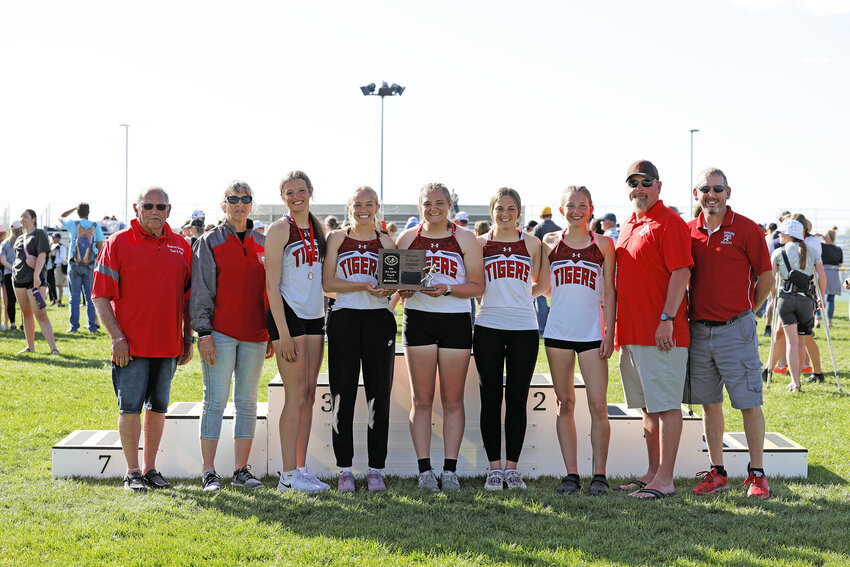 The NCHS Lady Tigers garnered third place at state track with 62 points. Pictured, from left, are coach Ron Nelson, coach Sandra Johnson, Gracie ZumBrunnen, Melody ZumBrunnen, Phoebe Allbright, Abby Glavan, Marleigh Smith, coach Chris Skeen and head coach Jim Lyons. Also on the team is Taci Bartschi.
