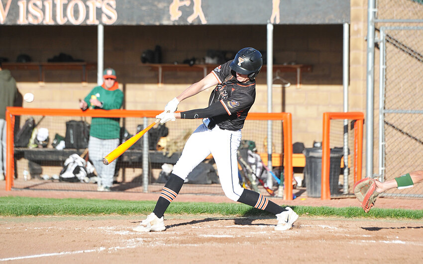 Mac Hibben connects on a hit for the Tigers against WESTCO on May 21. Hibben posted four hits against Chadron at the Gering PVC Tournament and struck out 11 as pitcher during the game against the Buckley Bombers.