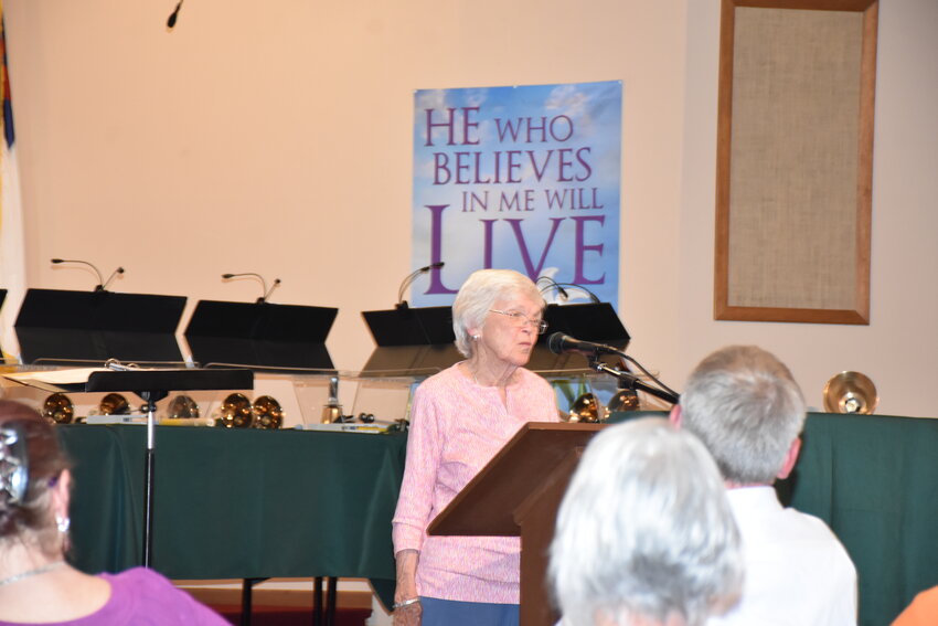 The Goshen County Historical Society’s sitting president, Mary Houser, introduces the special events for the final meeting of the season at the East Lake Baptist Church Tuesday evening.