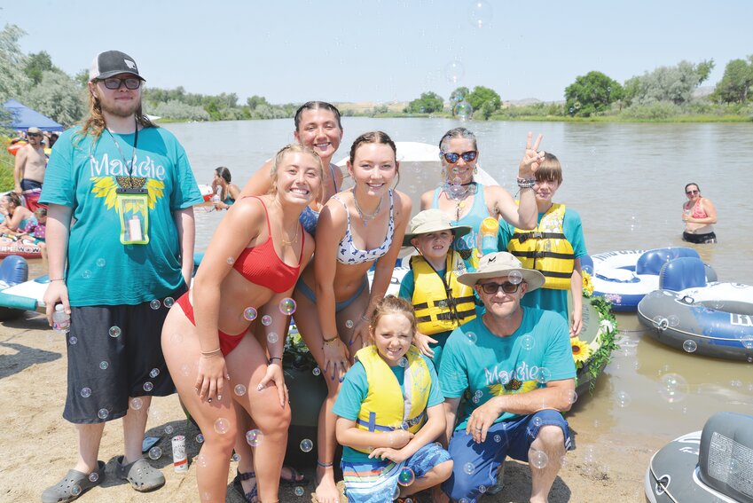 tte River named after her: Madison’s Beach. Pictured are Eli Nunn (standing in back, l-r), Alora Nunn, Mykal Stone, Jayma Tuttle, Jasmine Betters, George Betters; Brody Betters (kneeling), Jackson Betters (with the bubble-maker), and Jack Betters.
