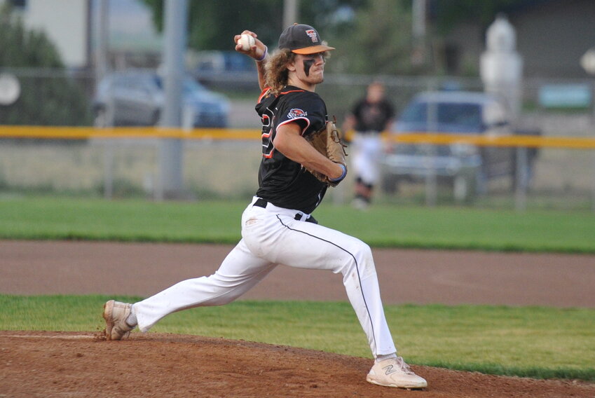 Ayden Desmond pitches against Wheatland during the district playoffs on July 24. Desmond earned 2024 first-team all-conference honors.