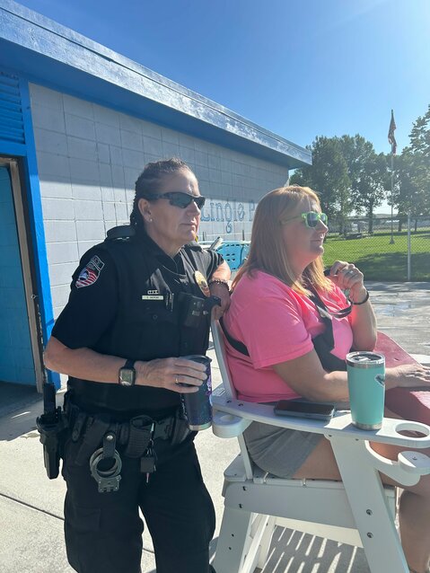 Chief Andrews and Brandi McCoid, assistant pool manager, on closing day of the Lingle pool.