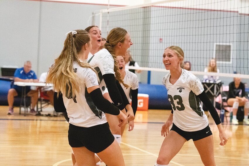 The Lady Blazers celebrate a point during the Bearcat Invite in Douglas over the weekend. Pictured, from left, are junior Natalie Long (No. 4), senior Olive Osmera (in back), senior Teryn Stokes, junior Brooklyn Asmus and junior Trishell Pontarolo.