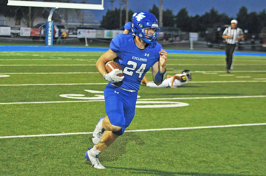 Junior T.J. Moats leaves an opponent from Wright in the dust while racing toward the end zone in the second half of the September 13 game.