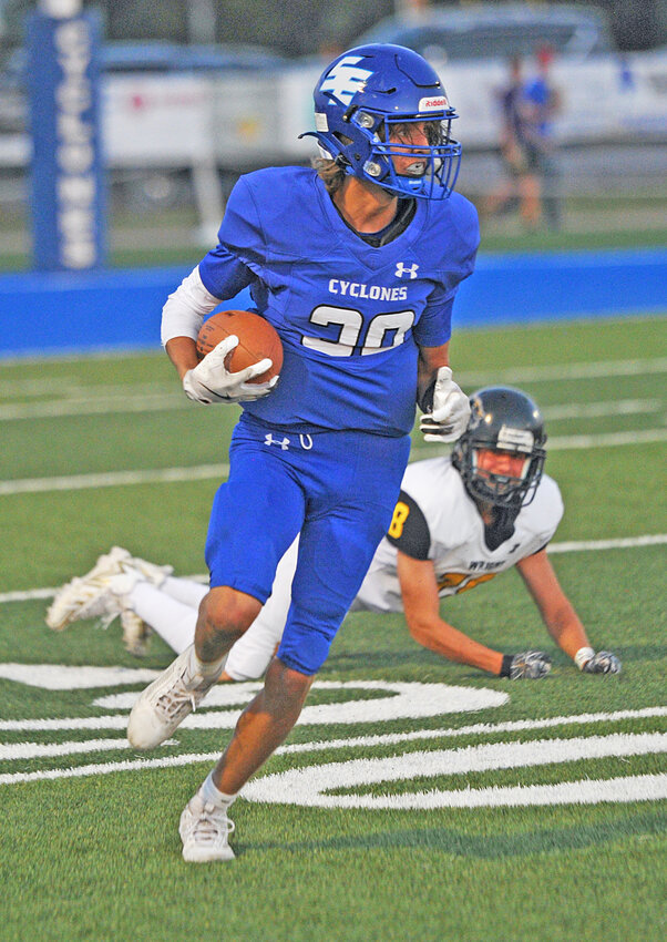 Senior Kannon Tippetts, pictured during the September 13 game against Wright, caught seven passes for 123 yards and three touchdowns against Wind River on September 20.