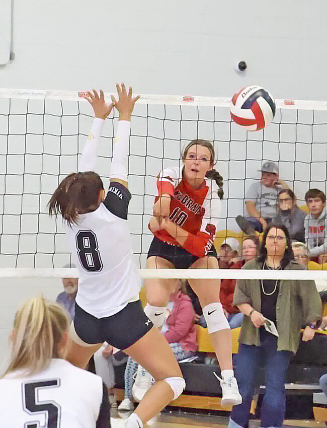 Sophomore Gracie ZumBrunnen slams over a kill against Guernsey on September 21.