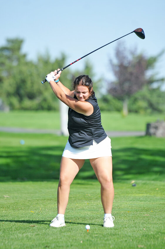 Goergie Lou Paterakis tees off at the EWC Invite on September 13. Paterakis broke into the top 10 at the Northeastern Junior College tournament on September 19-20.