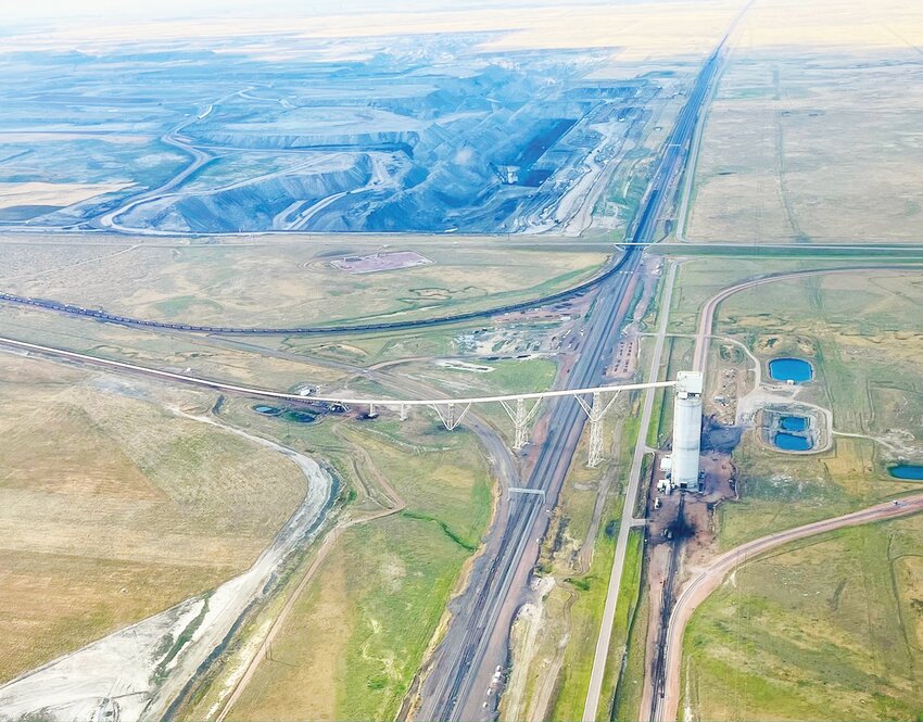 This July 2024 aerial shot depicts a load-out silo and the Black Thunder coal mine in the southern Powder River Basin.