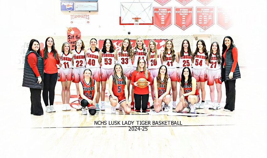 The 2024-2025 Niobrara County High School Lady Tigers basketball team. Pictured in back row, from left, are assistant coach Cora Fitzgerald, manager Skielynn Bouissey, Emily ZumBrunnen, Jaci Vetter, Addisyn Bauersachs, Marleigh Smith, Sarah Krein, Karlei Pontarolo, Brittin Bruch, Heidi DesEnfants, Addie Harvey, Veltie Mendoza, Bristol Cardwell and head coach Andie Hubbard. In front, from left, are Tessa Manning, Gracie ZumBrunnen, manager Haven Hendricks, Paige Potter and Hannah Krein.