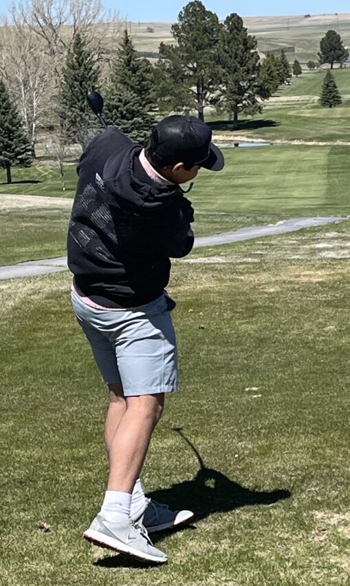 : Hudson Leimser tees off during the Tiger Invitational in Lusk.