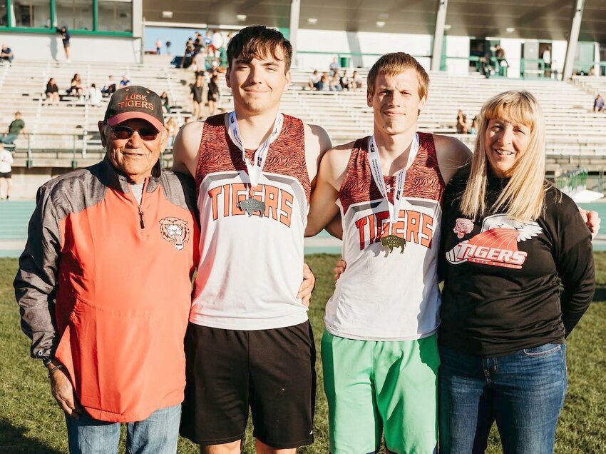 Coach Ron Nelson (left to right), Raynce Brott, Nathan Miller and Coach Sandra Johnson.