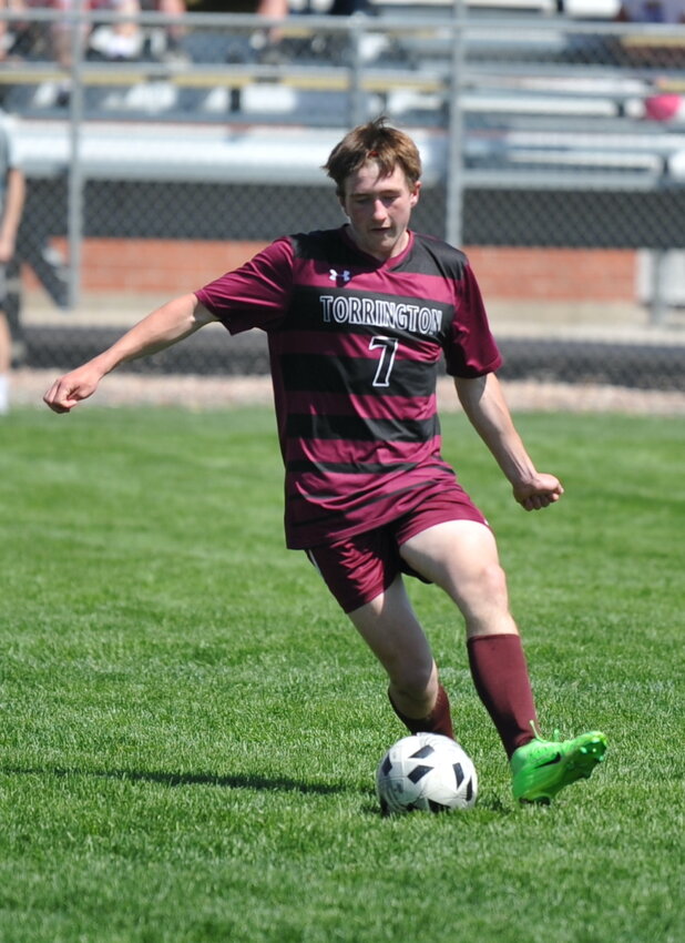 Junior Anthony Arnusch dribbles the ball into Buffalo’s territory during the May 10 home game against the Bison.
