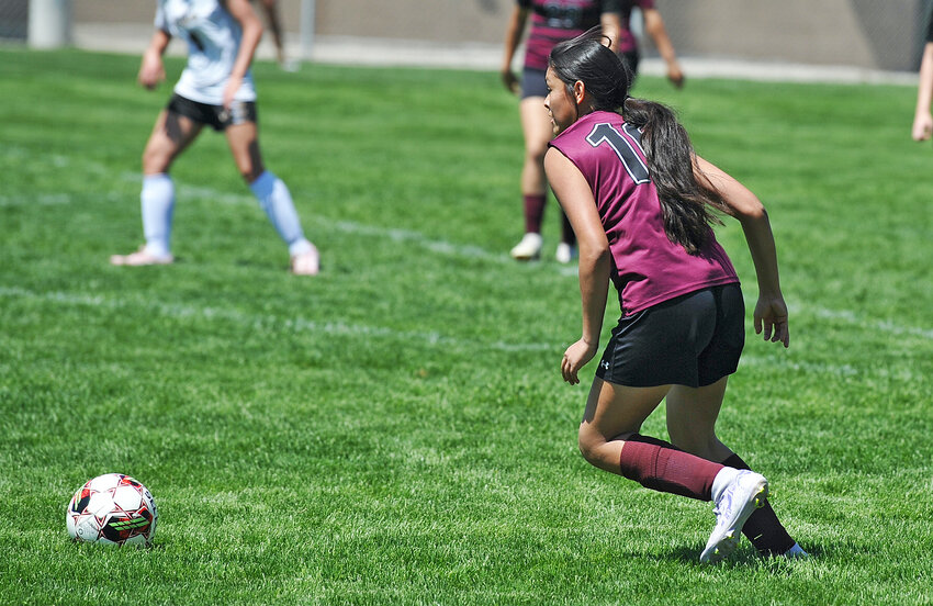 Freshman Rosa Munoz moves the ball into Buffalo territory at the home game on Saturday, May 10. Munoz put the Lady Blazers on the scoreboard with a goal in the second half.