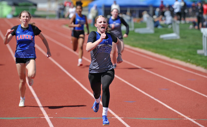 Junior Kaycee Kosmicki kicks it in for the final leg of the 400-meter prelims at the 1A East regional meet on Friday, May 16. Kosmicki went on to snag gold in the finals for the event with a new 1A/2A meet record. Kosmicki also won the 800-meters and 200-meters.