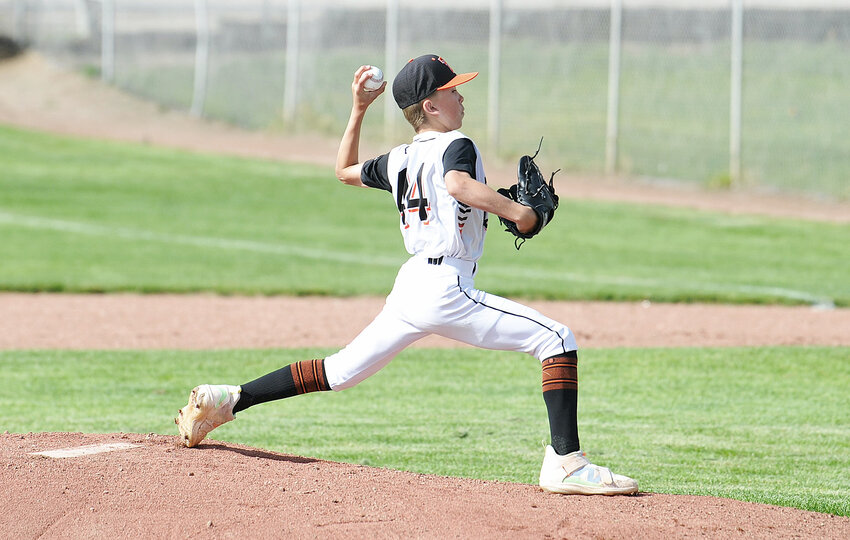 Patrick Mortimore winds up a pitch during the first home game between the Tigers ‘C’ team and Saratoga on Thursday, June 5. Mortimore pitched each of the four innings for the Tigers in the game, striking out seven.